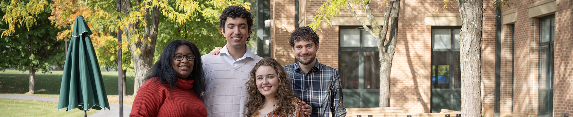 FCC students standing outside an academic building on campus.